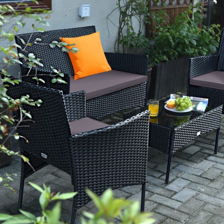 4 Pieces Patio Rattan Cushioned Sofa Set with Tempered Glass Coffee Table - 24" x 23.5" x 33" (L x W x H)