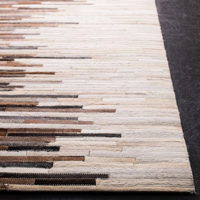 SAFAVIEH Handmade Studio Tobi Natural Hide Leather Rug