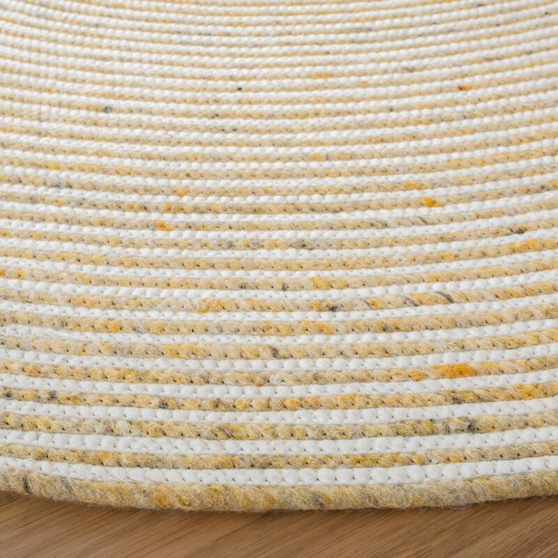SAFAVIEH, Handmade Braided Bahrie Wool Rug