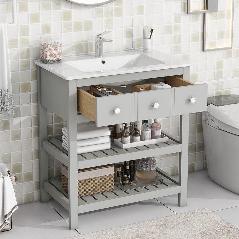 https://ak1.ostkcdn.com/images/products/is/images/direct/776348705fd064f229a9d3e2bb546553cbe1e044/30%27%27-Modern-Bathroom-Storage-Cabinet-with-2-Tier-Storage-Shelf-and-Single-Sink%2CGrey.jpg