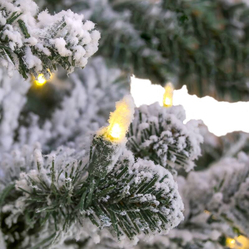 National Tree Company 9 ft. Snowy Hudson Hinged Tree with 1200 Dual Color LED Lights - 9 Foot