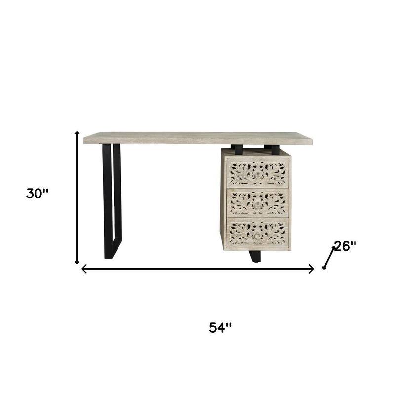HomeRoots 54" White and Black Solid Wood and Metal Carved Floral Desk With Three Drawers