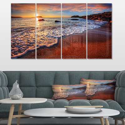 Designart "Stunning Ocean Beach at Sunset" Seashore Art Print on Canvas - Red