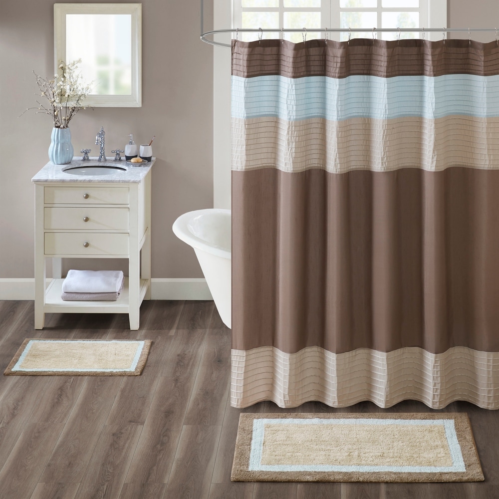 https://ak1.ostkcdn.com/images/products/is/images/direct/77d060596bc6f541f8e9f264c1e7778ffc563e1b/Madison-Park-Tradewinds-Cotton-Bath-Rug.jpg