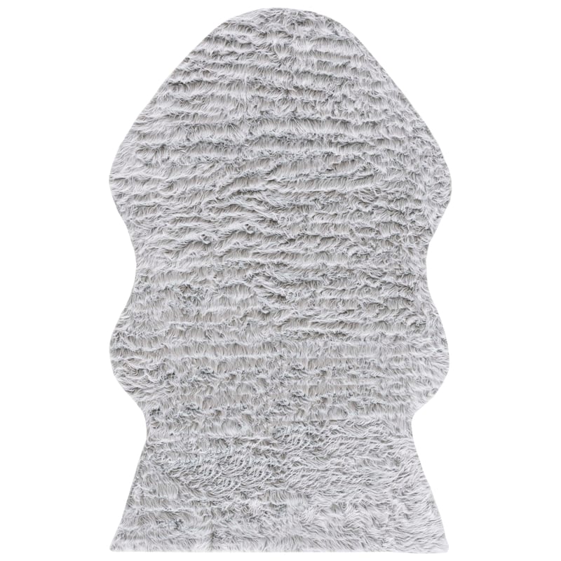 SAFAVIEH Faux Sheep Radena Christen Shag Solid Rug