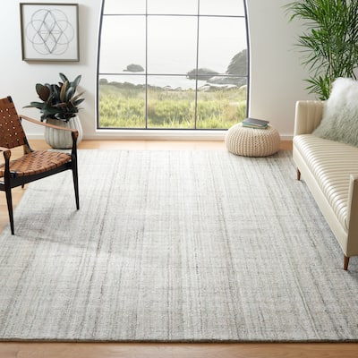 SAFAVIEH Handmade Abstract Olcay Modern Stripe Rug