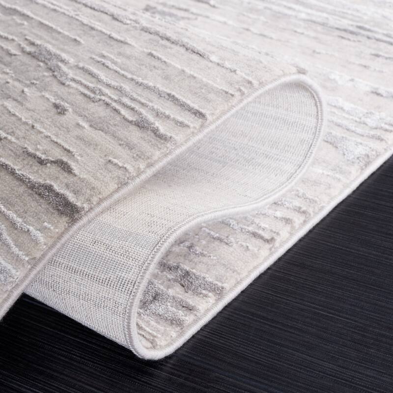 SAFAVIEH Diamond Einfrid Modern Abstract Fringe Rug