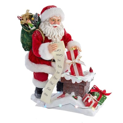 Kurt Adler 10.5-Inch Fabriche Battery-Operated Santa Next To Lit Chimney