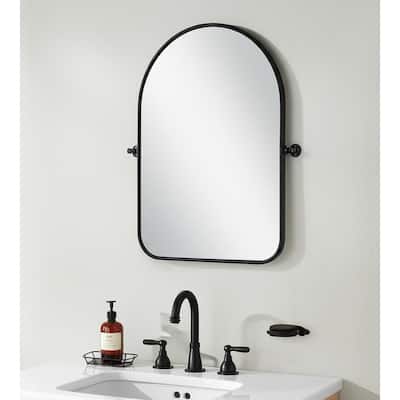 HomeRoots 32" Black Iron Arch Tilting Framed Bathroom Vanity Mirror - 23.00 in. x 32.00 in. x 1.57 in.