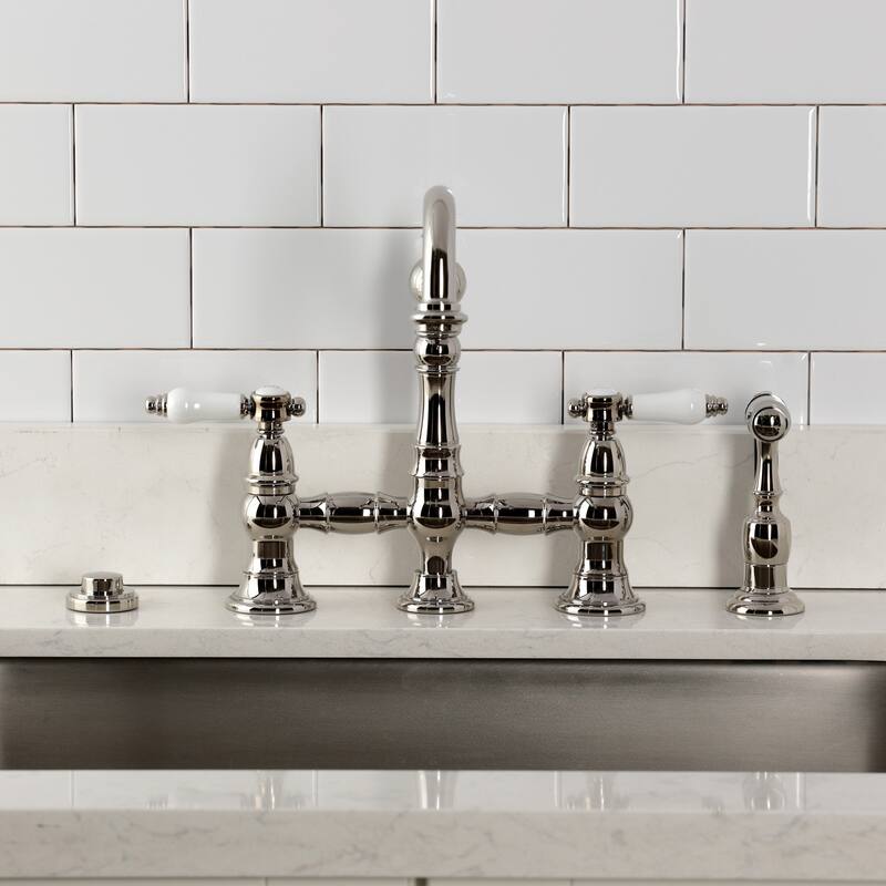 Kingston Brass Bel-Air Two-Handle 4-Hole Deck Mount Bridge Kitchen Faucet with Brass Side Sprayer