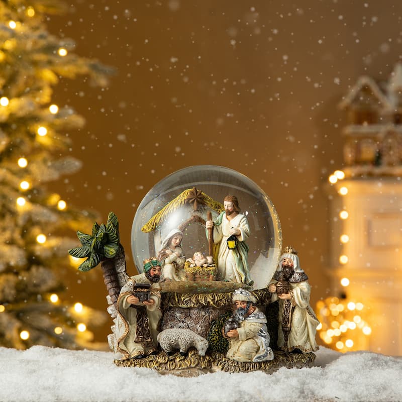 Glitzhome 8.25"H Oversized Resin Lighted Musical Snowflakes Nativity Waterglobe