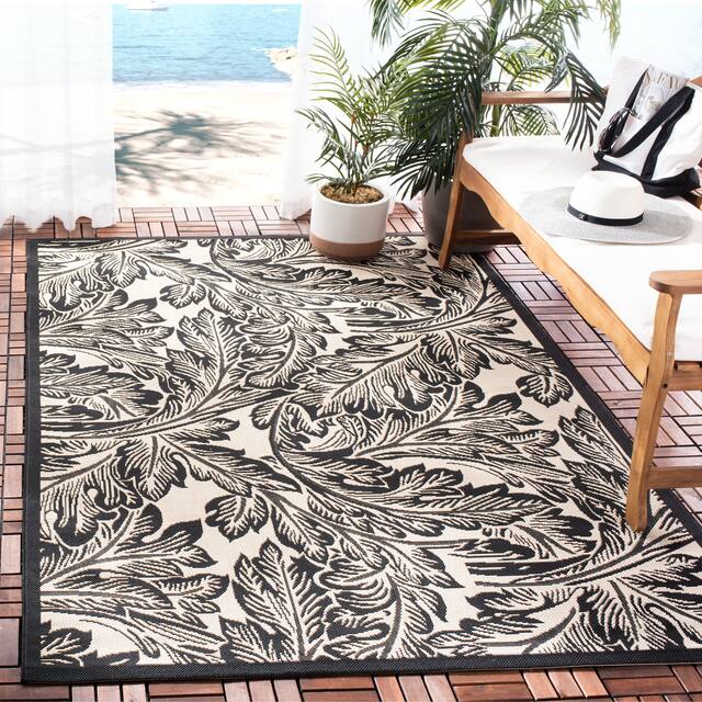 SAFAVIEH Courtyard Bettyjane Tropical Leaves Indoor/ Outdoor Area Rug - 6'7" x 9'6" - Sand/Black