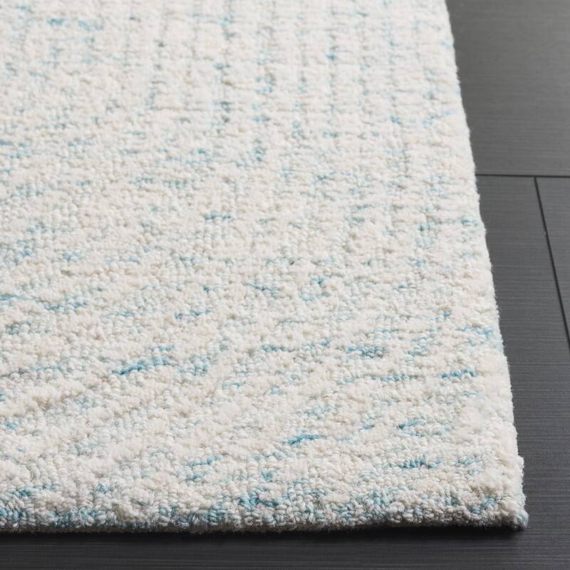 SAFAVIEH Handmade Pine Nevjana Modern Wool Rug