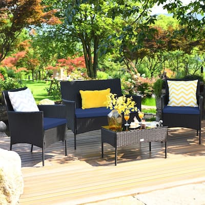 4 Pieces Patio Rattan Cushioned Sofa Set with Tempered Glass Coffee Table - 24" x 23.5" x 33" (L x W x H)