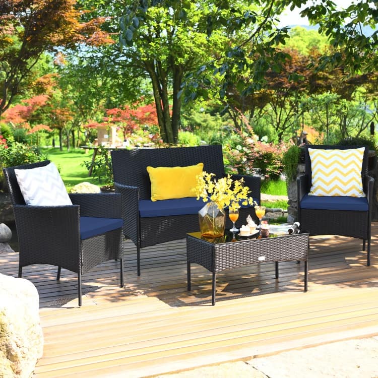 4 Pieces Patio Rattan Cushioned Sofa Set with Tempered Glass Coffee Table - 24" x 23.5" x 33" (L x W x H) - Navy