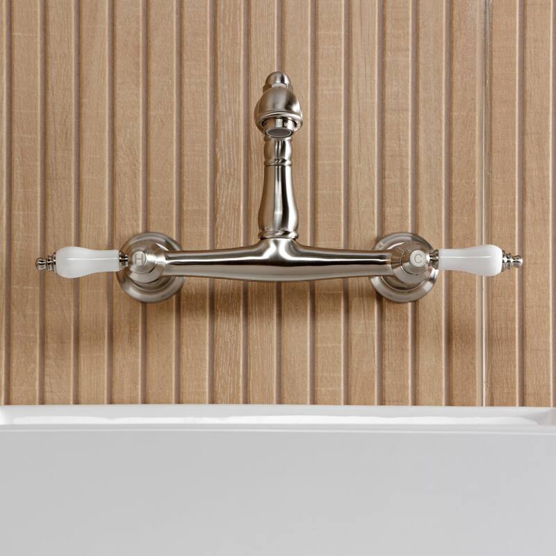 Kingston Brass English Country Two-Handle 2-Hole Wall Mount Bathroom Faucet