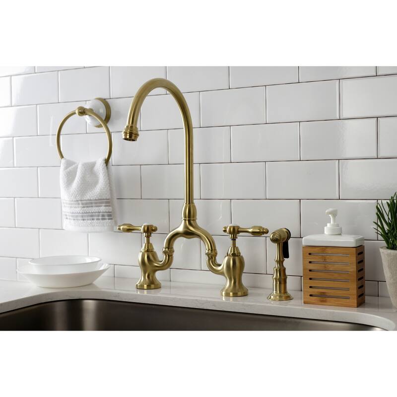 Kingston Brass Tudor Bridge Kitchen Faucet with Brass Sprayer
