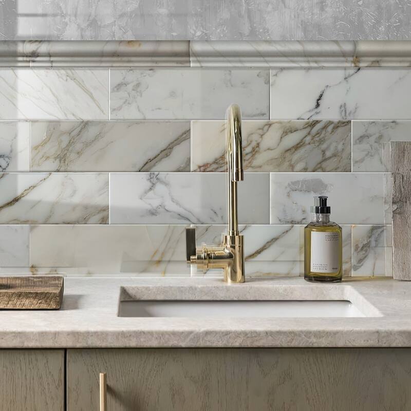 Apollo tile 4 x 12 Grandis Polished White Calacatta Gold Marble Tile (5 sq ft/case) - 15 Pack