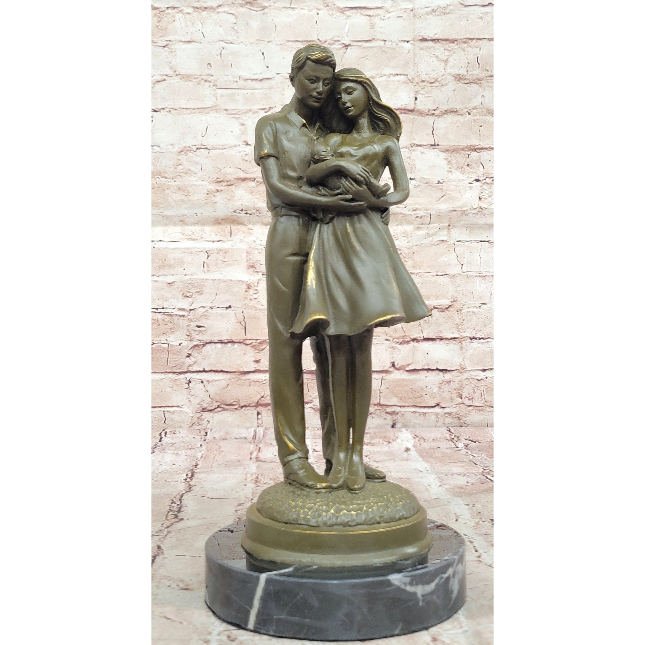 Bronze Sculpture Of Young Family Holding Newborn Baby By Milo