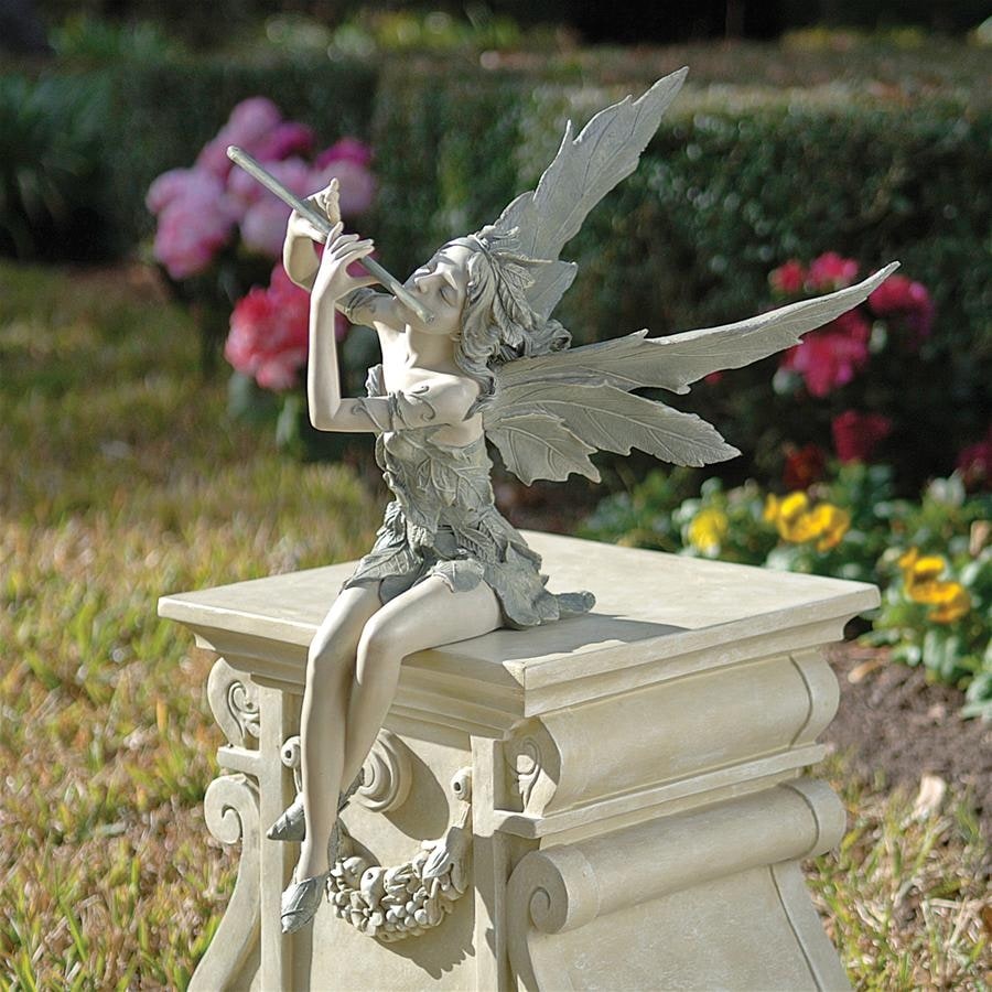 https://ak1.ostkcdn.com/images/products/is/images/direct/7976c66ce0fe1644dd8bdeb48fe880bada347379/Fairy-Of-The-West-Wind-Sitter-Statue.jpg