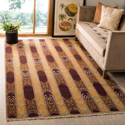 SAFAVIEH Couture Hand-knotted Migena Modern Wool Rug