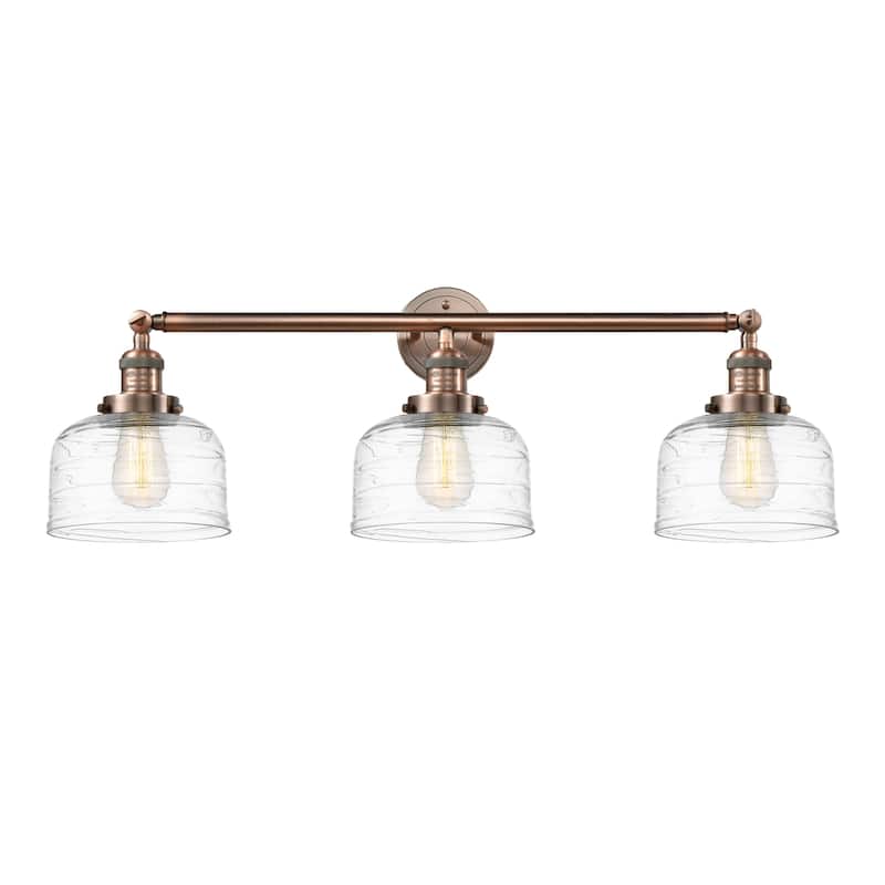Innovations Lighting 205-11-32 Bell Vanity Bell 3 Light 32" Wide - Antique Copper / Clear Deco Swirl