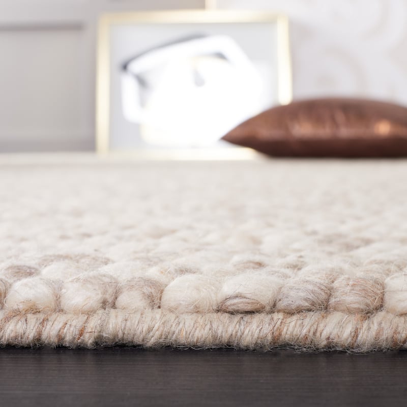 SAFAVIEH Handmade Natura Gonnie Wool Rug