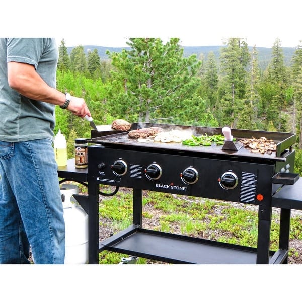 https://ak1.ostkcdn.com/images/products/is/images/direct/79a3a406ec5e8cc7a3c2252e0b036d004ebea0df/Blackstone-36-inch-Outdoor-Restaurant-grade-Propane-Flat-4-burner-Griddle-Cooking-Station.jpg?impolicy=medium