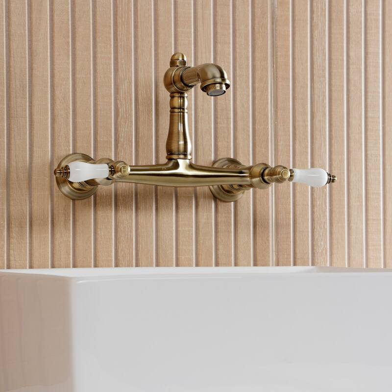 Kingston Brass English Country Two-Handle 2-Hole Wall Mount Bathroom Faucet