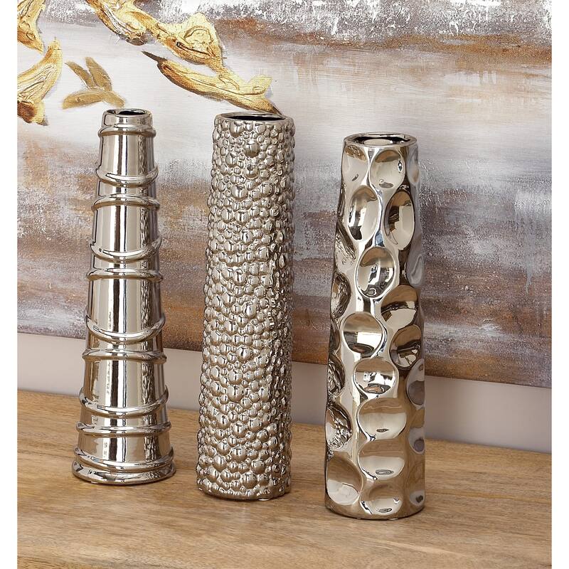 CosmoLiving by Cosmopolitan Sleek Ceramic Glam Vase with Varying Patterns (Set of 3) - Silver, Gold, Dark Blue, White
