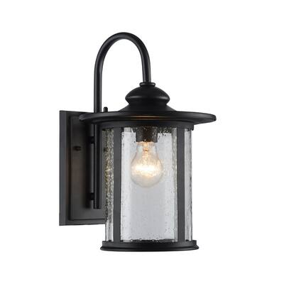 Textured Black 1-Light Outdoor Wall Sconce with Clear Seedy Cylinder Glass Shade