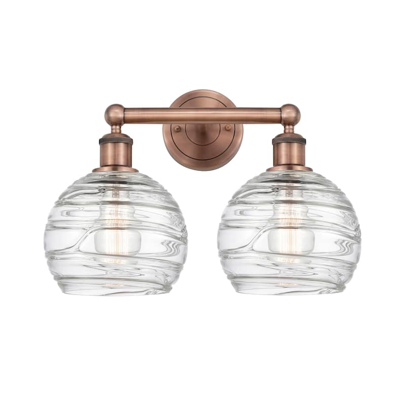 Innovations Lighting Athens Deco Swirl - 2 Light 17" Bath Vanity Light - Antique Copper/Clear Deco Swirl