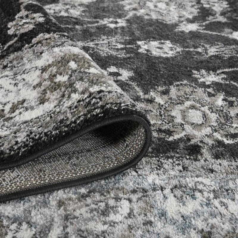 Aurelia Jiru Black Bordered Area Rug