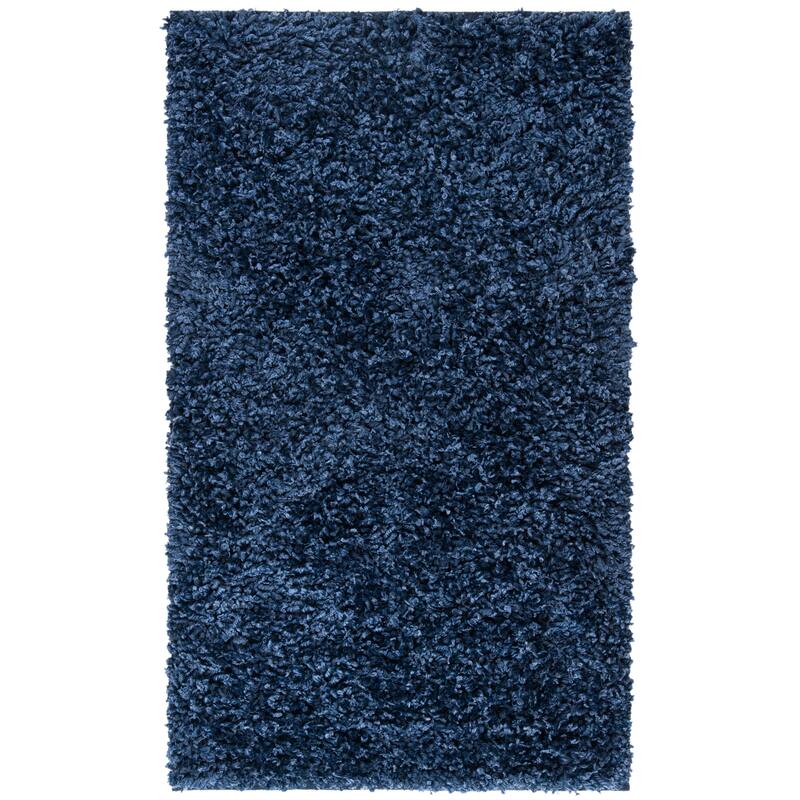 SAFAVIEH Handmade Sheep Shag Malti Solid Area Rug