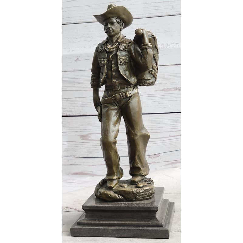 Country Western Cowboy In Chaps Carrying Imitative Horse Saddle Bronze Statue Sculpture Figure 12 Inches X 4 Inches