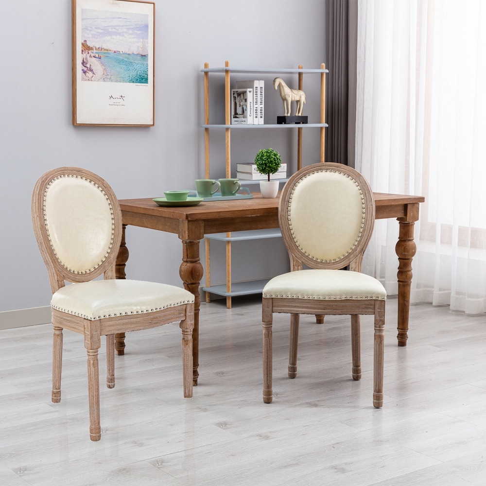 cream leather dining chairs with oak legs