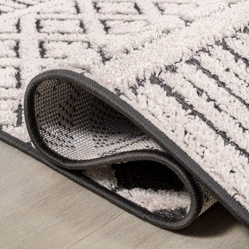 JONATHAN Y Duenas High-Low Two-Tone Monstera Leaf Area Rug