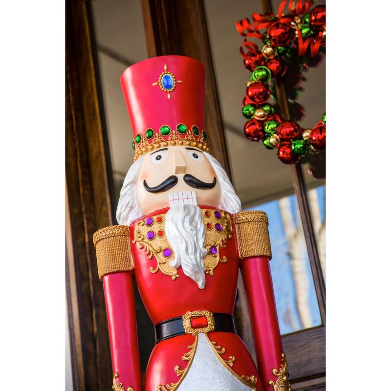 55 in. Regal Nutcracker Home and Garden Statue - Multicolor