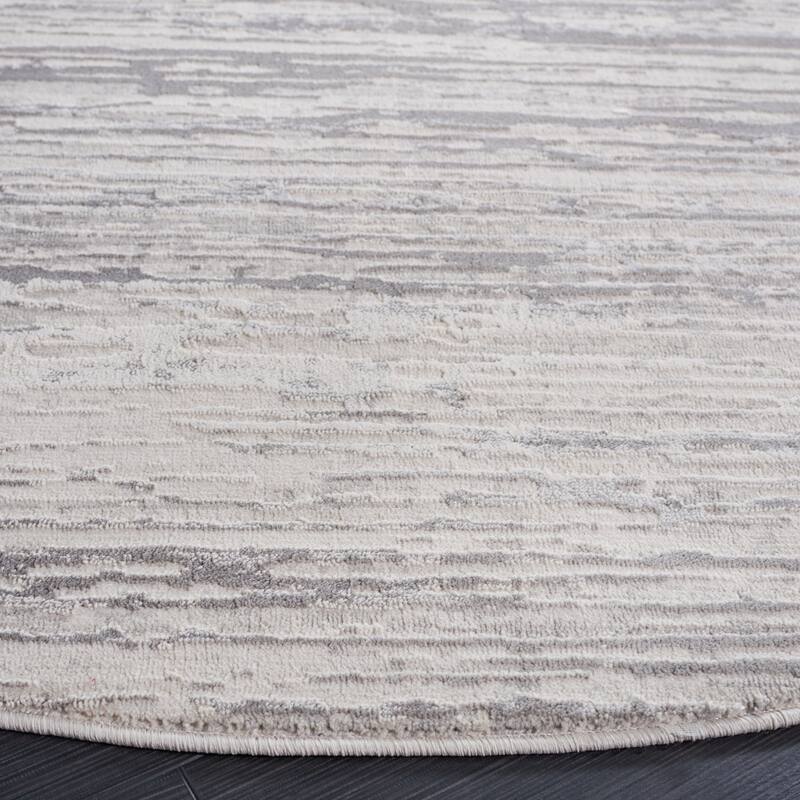 SAFAVIEH Diamond Einfrid Modern Abstract Fringe Rug