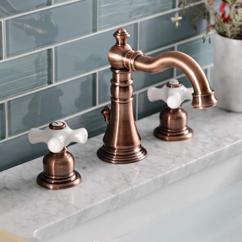 Kingston Brass American Classic Two-Handle 3-Hole Deck Mount Widespread Bathroom Faucet with Pop-Up Drain