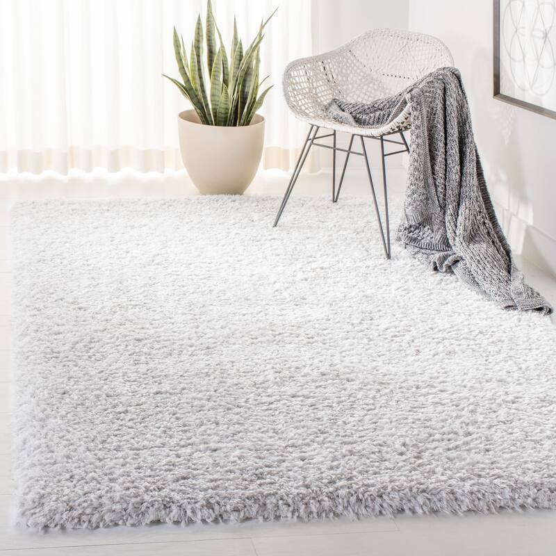 SAFAVIEH Flokati Vojsava Shag Solid Rug - 5'3" x 7'6" - Ivory/Grey