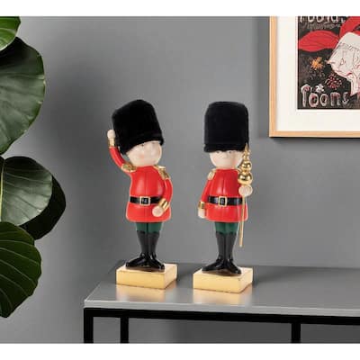 HomeRoots Set of Two Black Gold And Red Polyresin Christmas Nutcracker Figurines - 3.00 in. x 9.25 in. x 2.50 in.