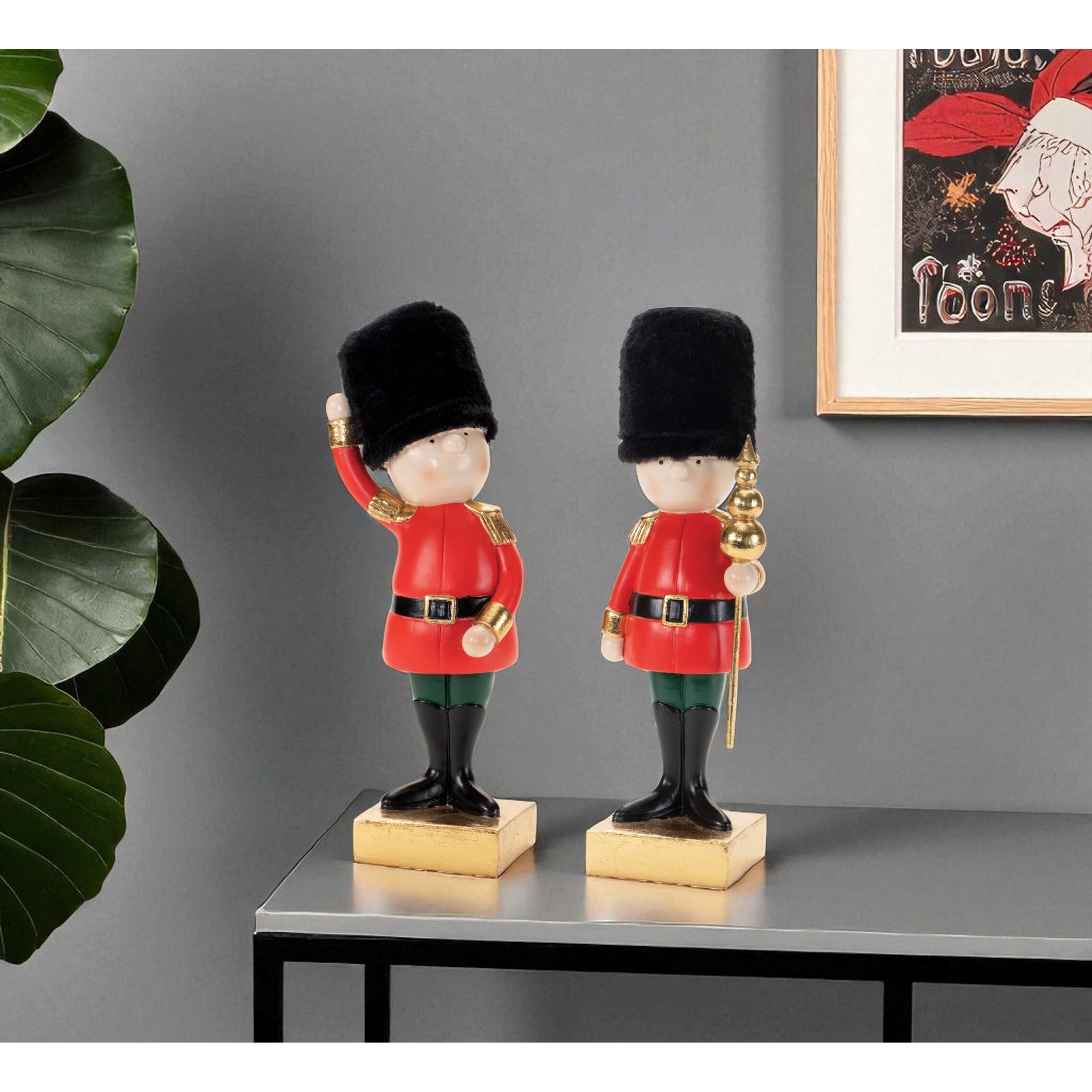 HomeRoots Set of Two Black Gold And Red Polyresin Christmas Nutcracker Figurines - 3.00 in. x 9.25 in. x 2.50 in.