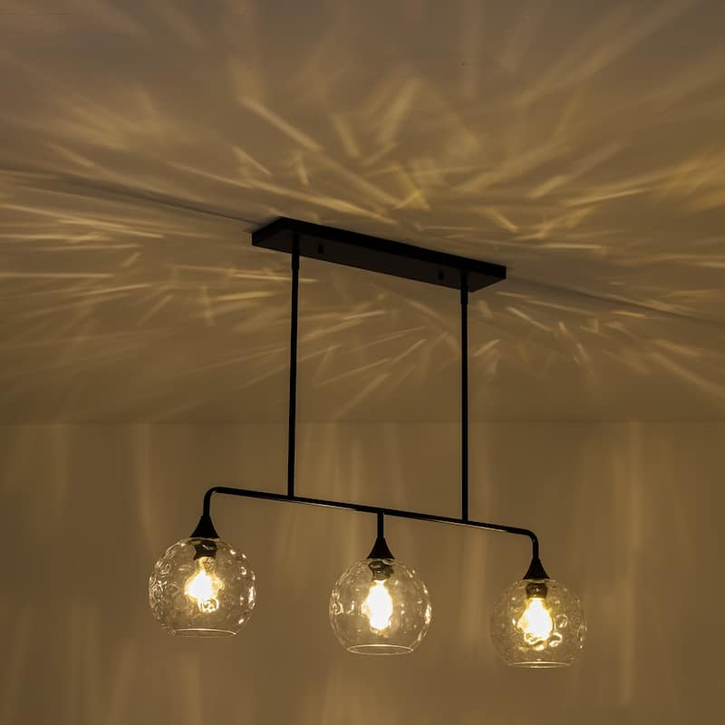 3-Light Modern Black/Brushed Gold Linear Chandelier for Kitchen Island with Clear Textured Glass Globe Shades