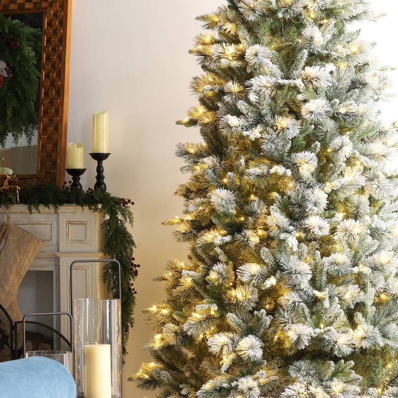 Glitzhome 11ft Pre-Lit Flocked Slim Pine Artificial Christmas Tree with 850 Lights and Foot Pedal
