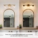preview thumbnail 11 of 20, Cionar Mid-century Modern Gold Bathroom Vanity Light Globe Wall Sconce with Clear Glass Shades
