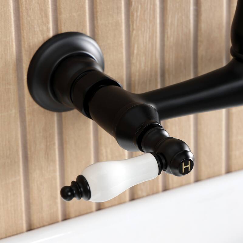 Kingston Brass English Country Two-Handle 2-Hole Wall Mount Bathroom Faucet