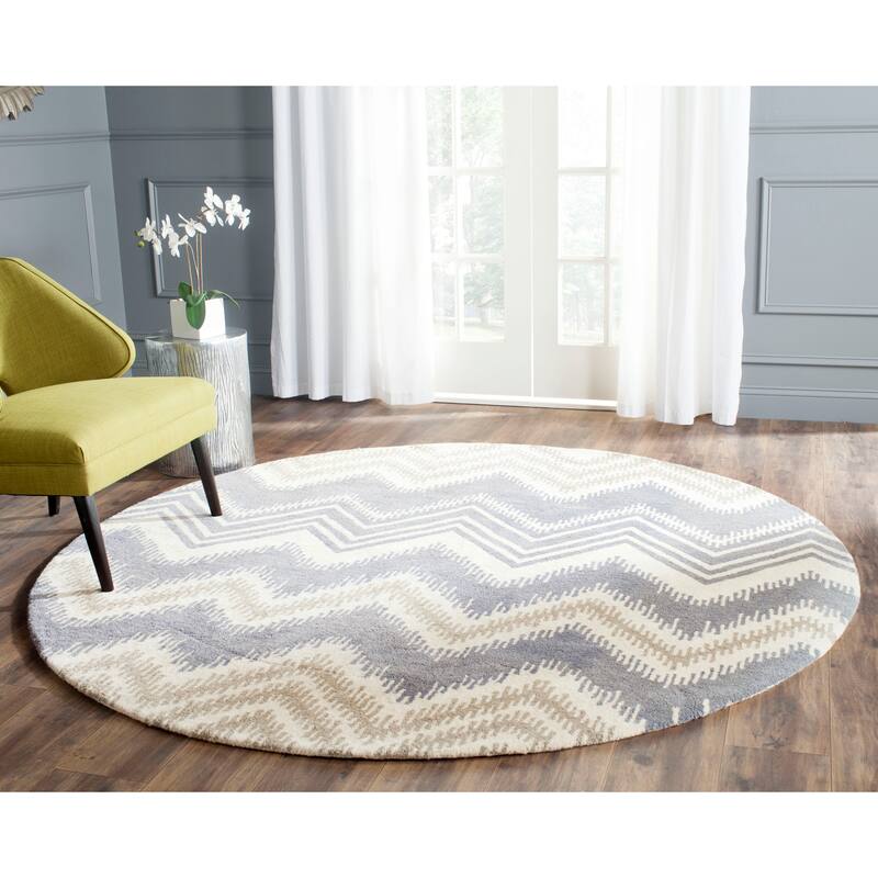 SAFAVIEH Handmade Capri Alexanne Modern Wool Rug - 7' Round - Blue/Ivory