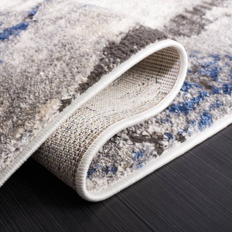 SAFAVIEH Petra Florrie Modern Abstract Rug