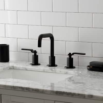 Kingston Brass Whitaker Two-Handle 3-Hole Deck Mount Widespread Bathroom Faucet with Push Pop-Up